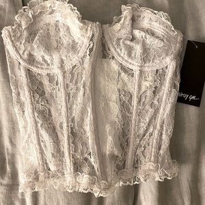 “Totally bored Laced Corset Top” from NastyGal